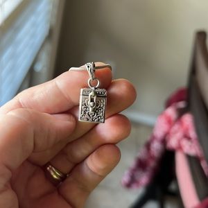 Very cute keepsake charm necklace. Sterling silver chain.
